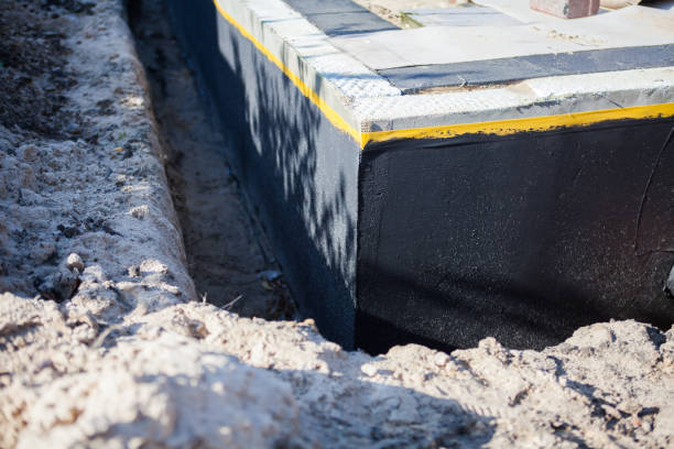 Professional Waterproofing technician working in Hampton, IL